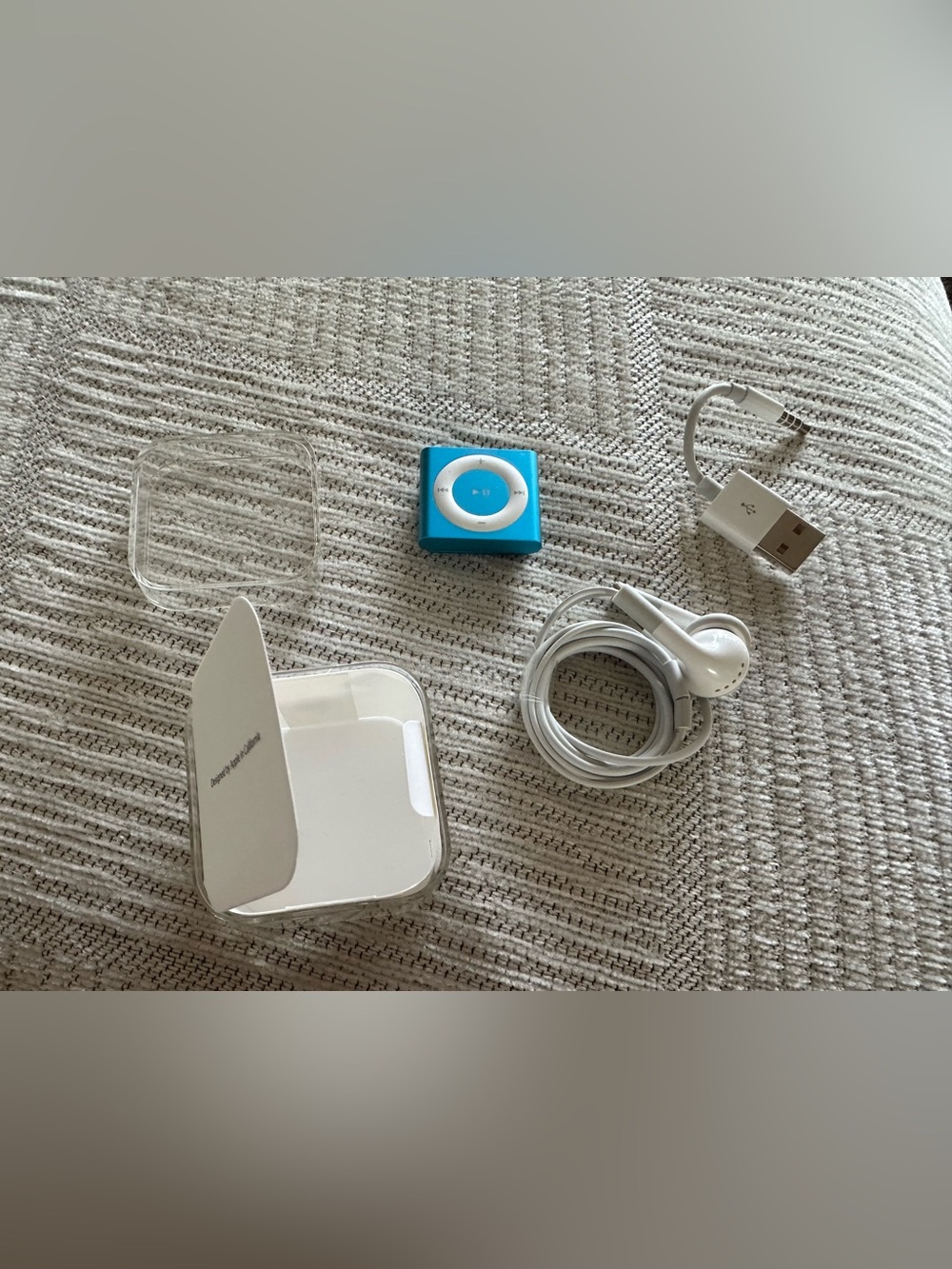 2gb Blue iPod Shuffle with Accessories- original packaging-never used.